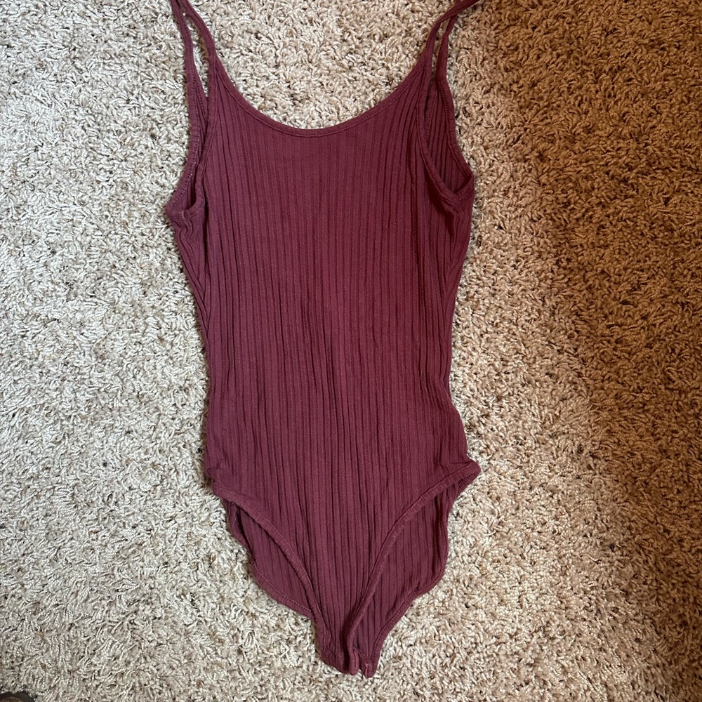 Women’s open back body suit size small